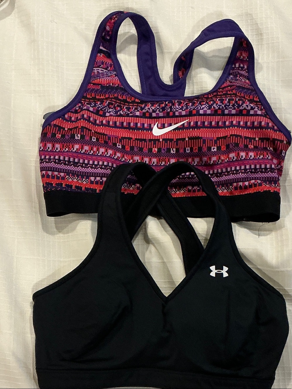 Nike Pink & Purple Patterned Racerback Sports Bra and Black under armour bra
